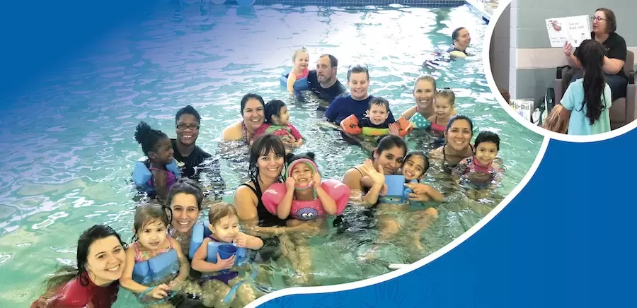 Group of Kids playing in the pool and then having story time at the Schertz Family YMCA