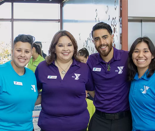 At the Y, we are for all! A group of YMCA Staff members pose for picture